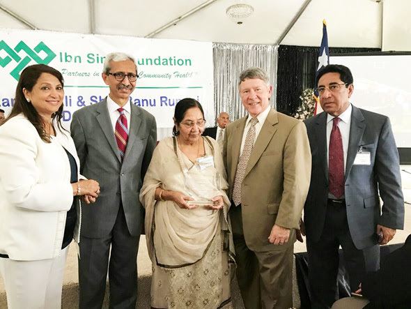 From right, Abdul Aziz Rupani, Judge Ed Emmett, Sher Banu Rupani and Nasruddin Rupani and his wife.