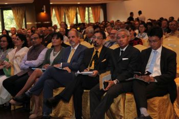 Mohamed Keshavjee (in yellow shirt) flanked by The Thai Ambassador to his right and the UN Resident Coordinator Stefan Preisner to his left. To Preisner's left is Mrs Preisner and to her left is the Indian High Commissioner to Malaysia H.E. T.S Tirumurti and Mrs Tirumurti. Photo credit: Parvaiz Machiwala