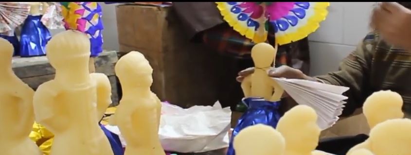 Why is Mawlid al-Nabi celebrated with Arouset El-Moulid (a sugar doll)?