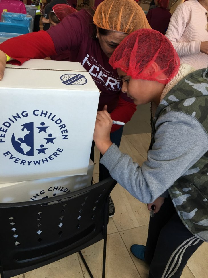 Over 500 Ismaili volunteers of all ages, assembled 80,000 meals for Atlanta’s children and seniors in need