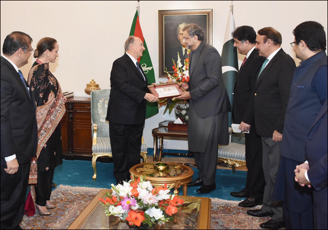 Prime Minister presents First Day Cover - Six Stamps - illustrating the contribution of the Aga Khan Development Network in Pakistan