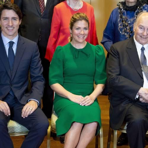 Prime Minister Justin Trudeau and his wife Sophie Gregoire Trudeau sit for a photo with the Aga Khan before a reception to mark his Diamond Jubilee as 49th Hereditary Imam of the Shia Imami Ismaili Muslims at Rideau Hall in Ottawa on Wednesday, May 2, 2018. (Justin Tang/The Canadian Press via AP)
