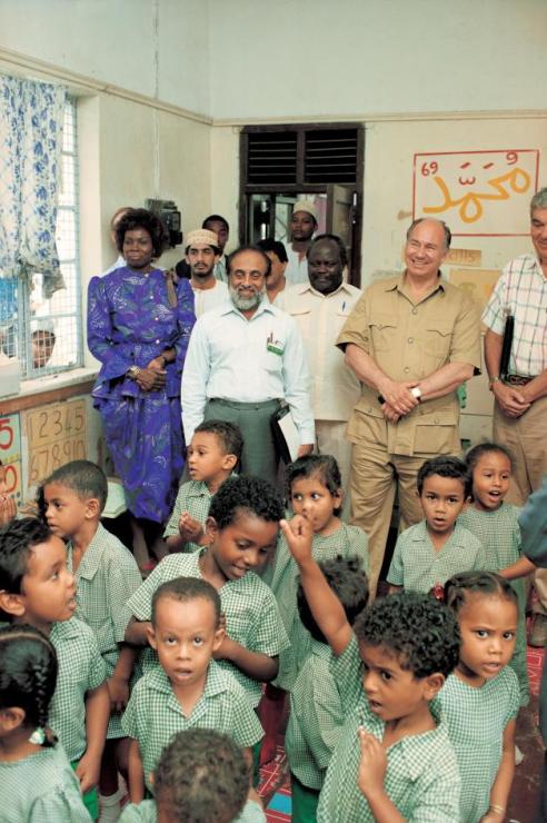 His Highness the Aga Khan visiting the Madrasa Resource Centre in Mombasa during his visit to Kenya (8-18 July 1991). Since 1986, the Madrasa Resource Centre in Kenya (MRCK) has trained over 500 Madrasa community pre-school teachers and has benefited nearly 7,800 students. MRCK has trained over 675 school management committee members (47 percent women) and more than 125 community resource team members (69 percent women). As of 2007, MRCK was working with over 75 community pre-schools throughout Kenya with nearly 2,900 students enrolled (48 percent girls). The programme’s integrated curriculum has influenced national policy and practice, and has trained and supported over 2,000 pre-school teachers. - Photo credit: AKDN / Gary Otte