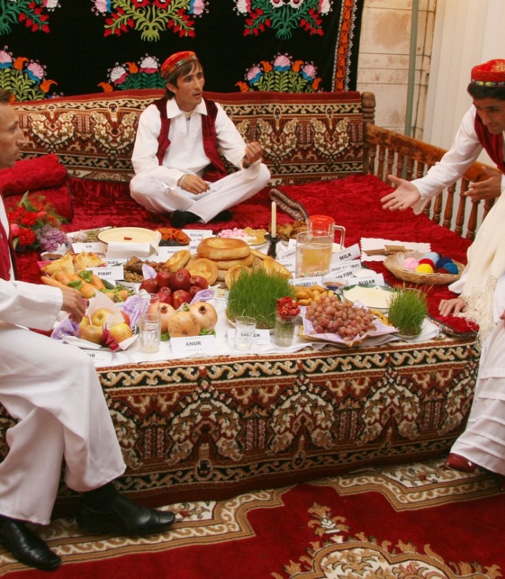 A family illustrates a traditional Tajik Navroz meal according to the “haft-shin” and “haft-sin” traditions. MIKHAIL ROMANYUK - The Ismaili https://the.ismaili