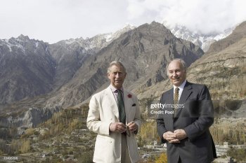 Skardu, Pakistan - November 3, 2006: Prince Charles, Prince of Wales poses with His Highness Prince Karim Aga Khan IV as they tour Altit village in Skardu, Northern Pakistan. This was the sixth day of the Royal Tour of Pakistan. Skardu is a remote area of the Pakistan Himalayas. Image credit: Pool / Getty Images