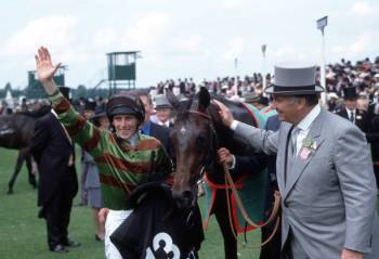 Ascot, UK. June 17, 1999: His Highness Prince Karim Aga Khan IV (R) owner of Irish horse Enzeli with Irish Jockey Johnny Murtagh (L) after winning the Gold Cup at Royal Ascot. Image credit: Trevor Jones / Popperfoto via Getty Images