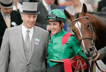 York, England. 2005: French jockey Christophe Soumillon (R) celebrates with horse owner His Highness Prince Karim Aga Khan IV (L) after winning the Queen Anne Stakes on Valixir at Royal Ascot. Image credit: Reuters
