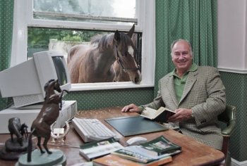 Aiglemont, France. September 1997: His Highness Prince Karim Aga Khan IV with horse peeking into his office. Image credit: Jean-Claude Deutsch / Paris Match via Getty Images