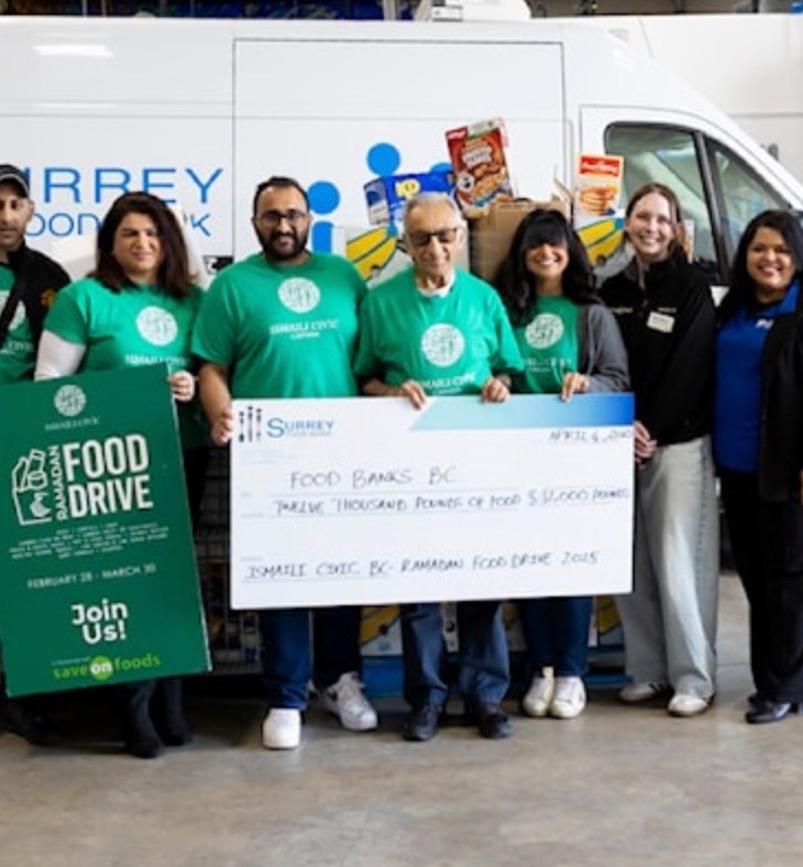 Partners from St. Monica's Roman Catholic Parish, Staff from Surrey Food Bank, Save-On Foods Sunwood, Manager, Israel Martins, Volunteers from Ismaili CIVIC, Save-On Foods Willingdon, Assistant Manager- Brooklyn Murphy, Hajira Hussein, Executive Director of Richmond Food Bank, Partners from St. Monica's Roman Catholic Parish and Staff from Surrey Food Bank pose for a photo at Surrey Food Bank on Friday, April 4, 2025 in Surrey. Anna Burns/ Surrey Now-Leader